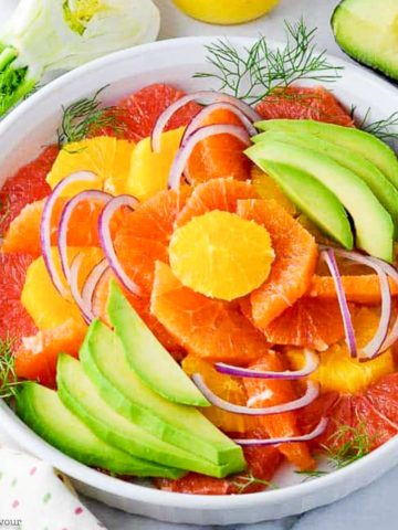 Grapefruit Orange Avocado Salad arranged in concentric circles