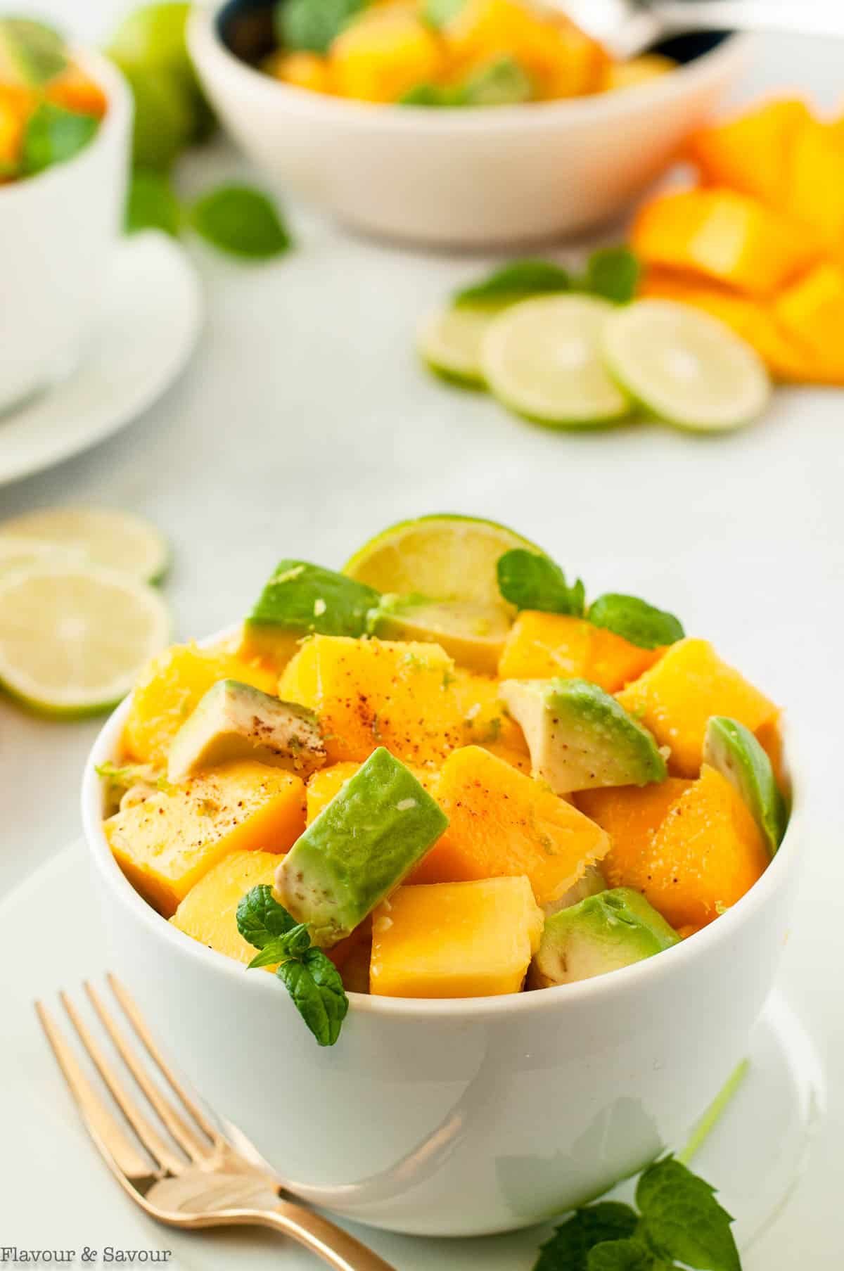 Close up view of a bowl of Mango Avocado Chili Lime Salad