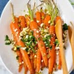 Roasted Carrots topped with Feta Cheese, pistachios and parsley
