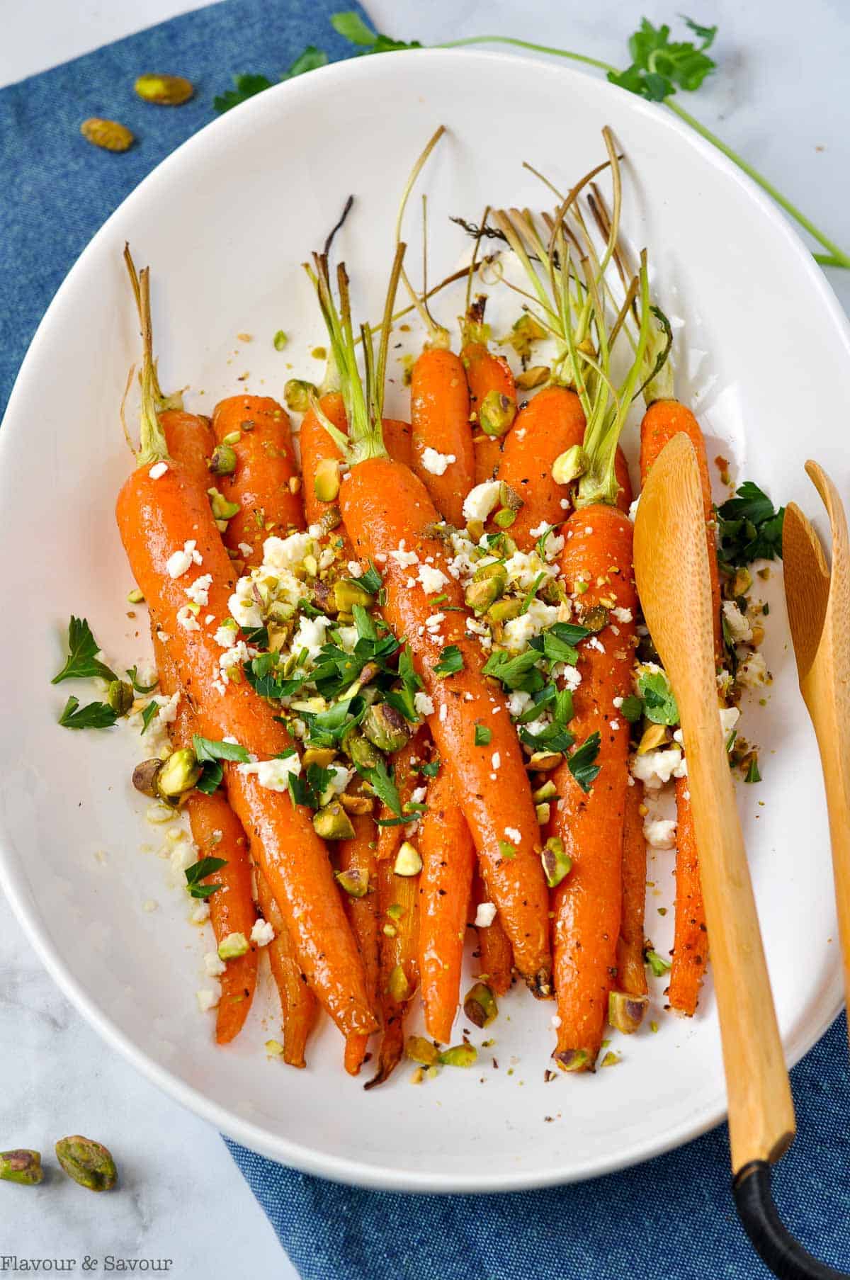 Whole Roasted Carrots sprinkled with feta, chopped pistachios and parsley.