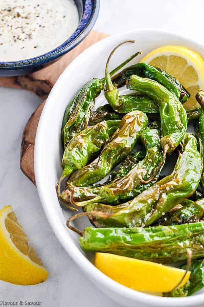 Air Fryer Shishito Peppers with Lemon Aioli Dip with lemon slices