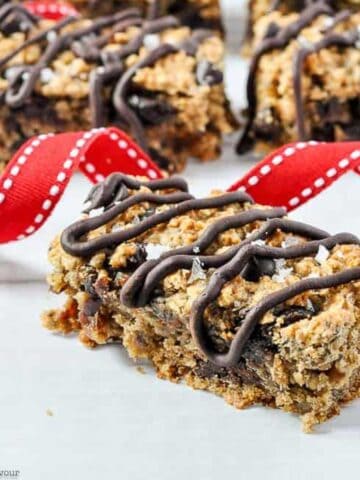 Close up view of a single chocolate cherry chia oatmeal bar