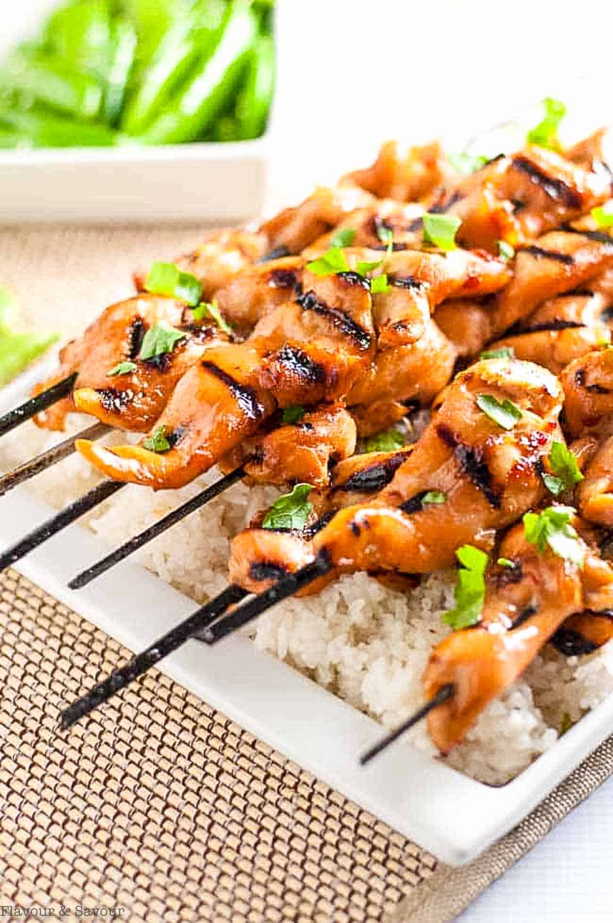 A platter of Thai-flavoured skewered chicken kabobs.