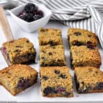 Blackberry oatmeal breakfast bars cut in squares.