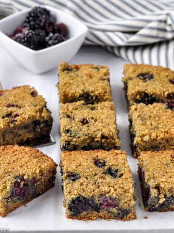 Blackberry oatmeal breakfast bars cut in squares.