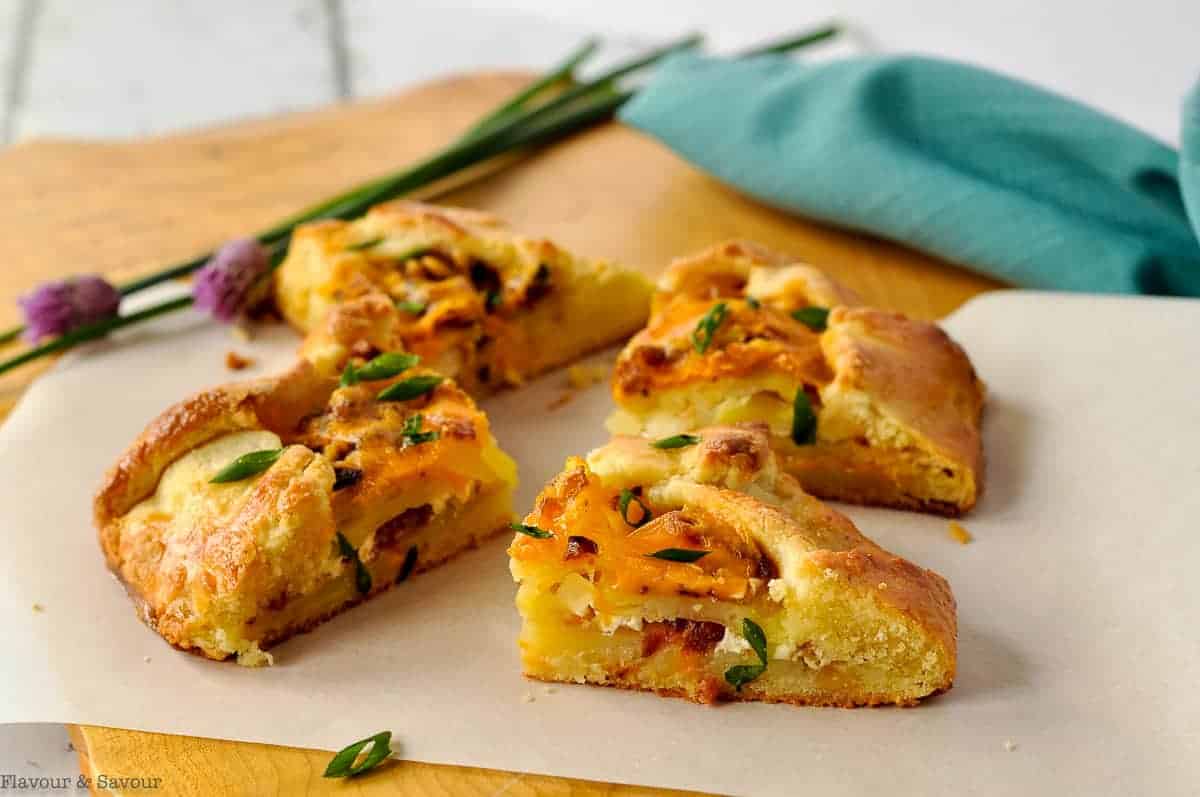 four wedges of Gluten-Free Potato Galette with bacon and cheese.