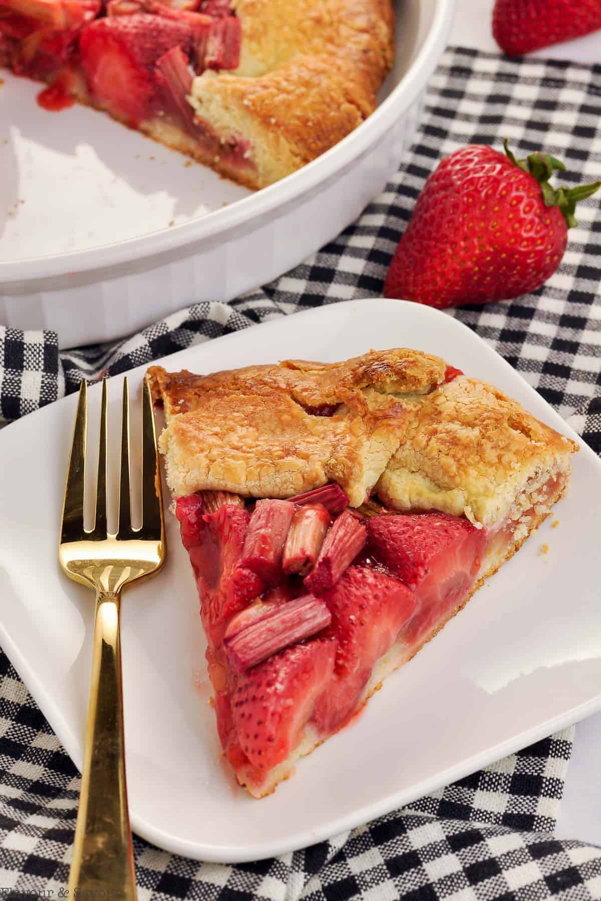 This gluten-free Strawberry Rhubarb Galette is the most delicious rustic fruit pie you can imagine! A crisp free-form crust filled with sweet strawberries and tart rhubarb makes a casual dessert for any time of the year.