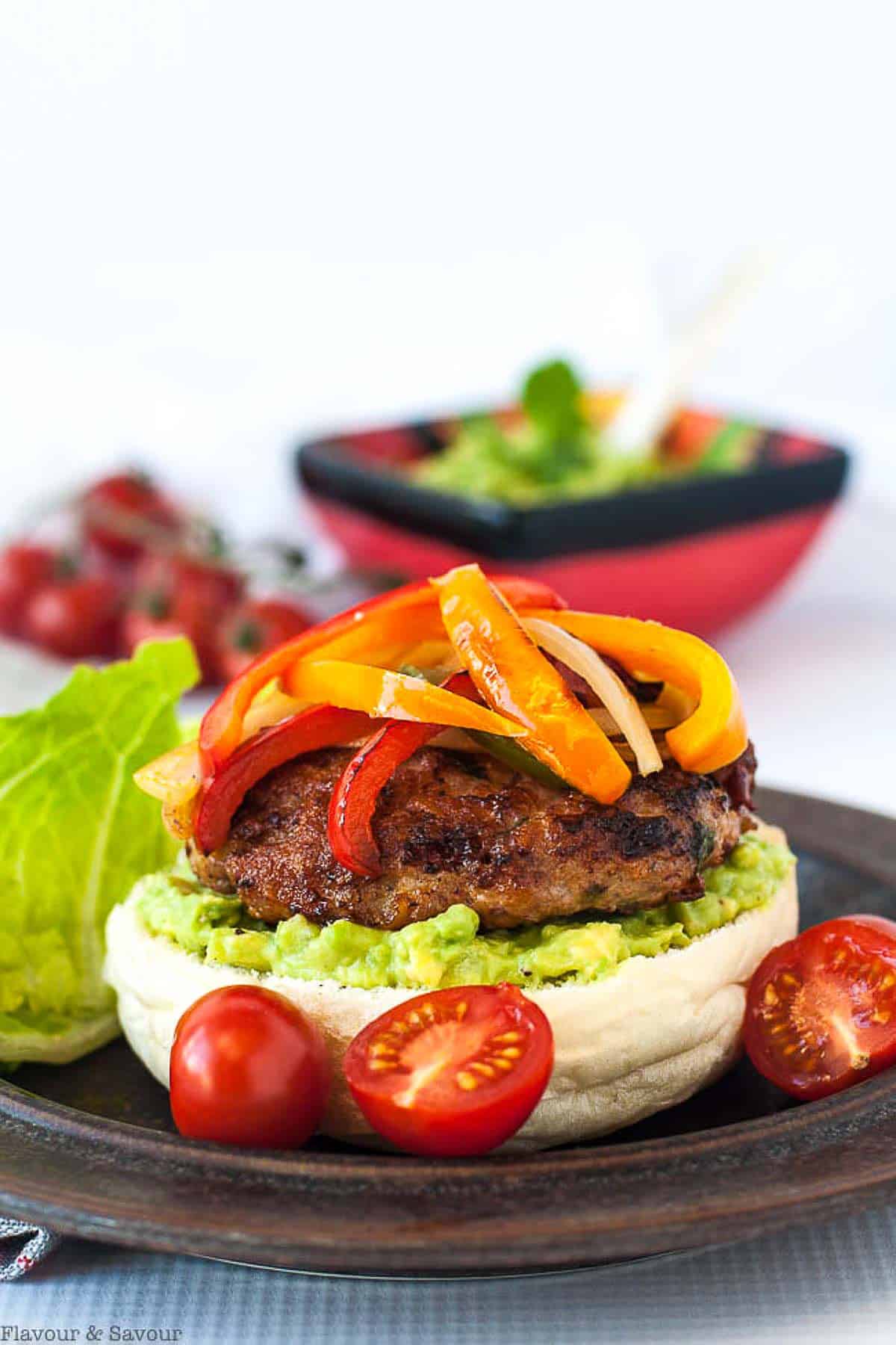 Chicken Fajita Burgers with tomatillo guacamole.