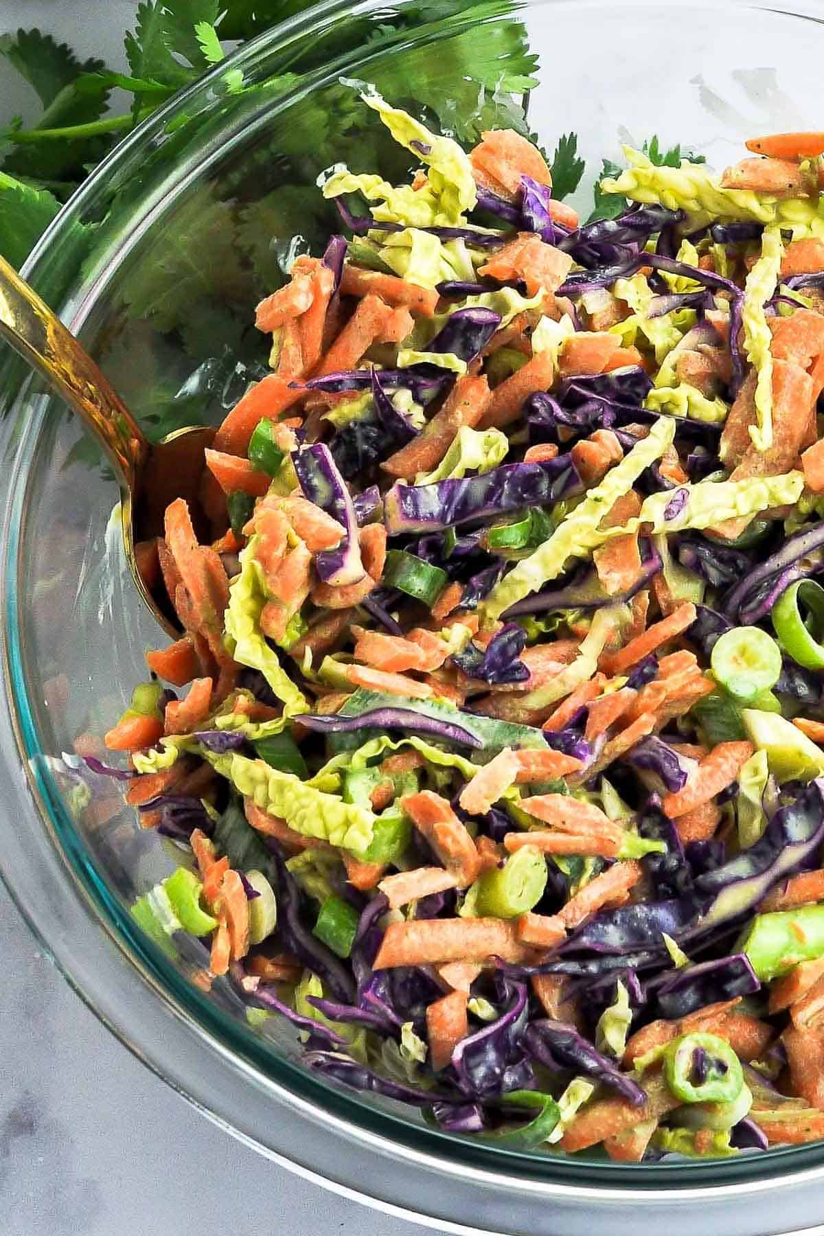 Cilantro Lime Slaw for Shredded Chicken Tacos in a glass bowl