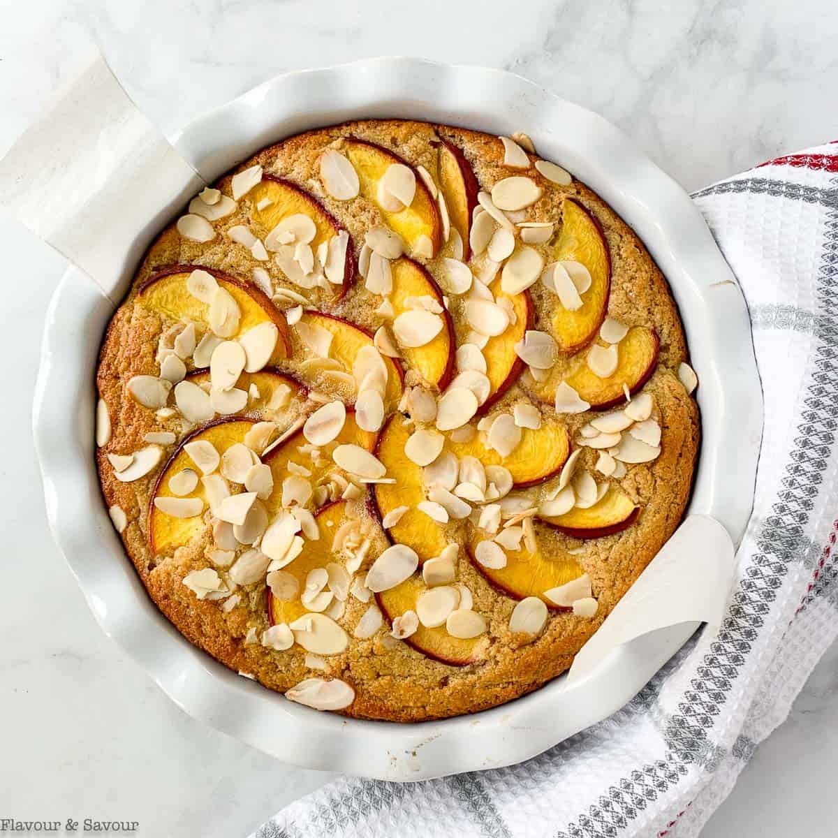 Baked Nectarine Ricotta Cake in a cake pan