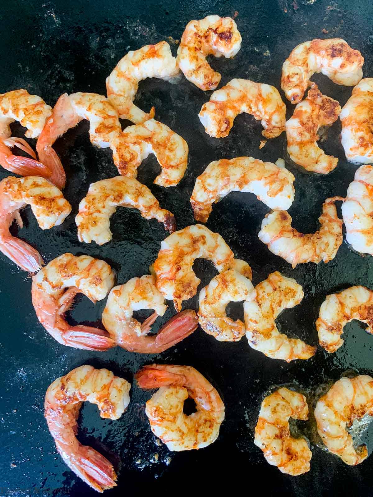 Grilled Prawns or shrimp on a flat grill.