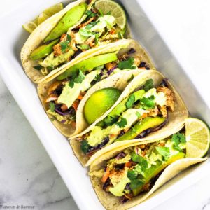 Shredded Chicken Tacos in a white serving dish