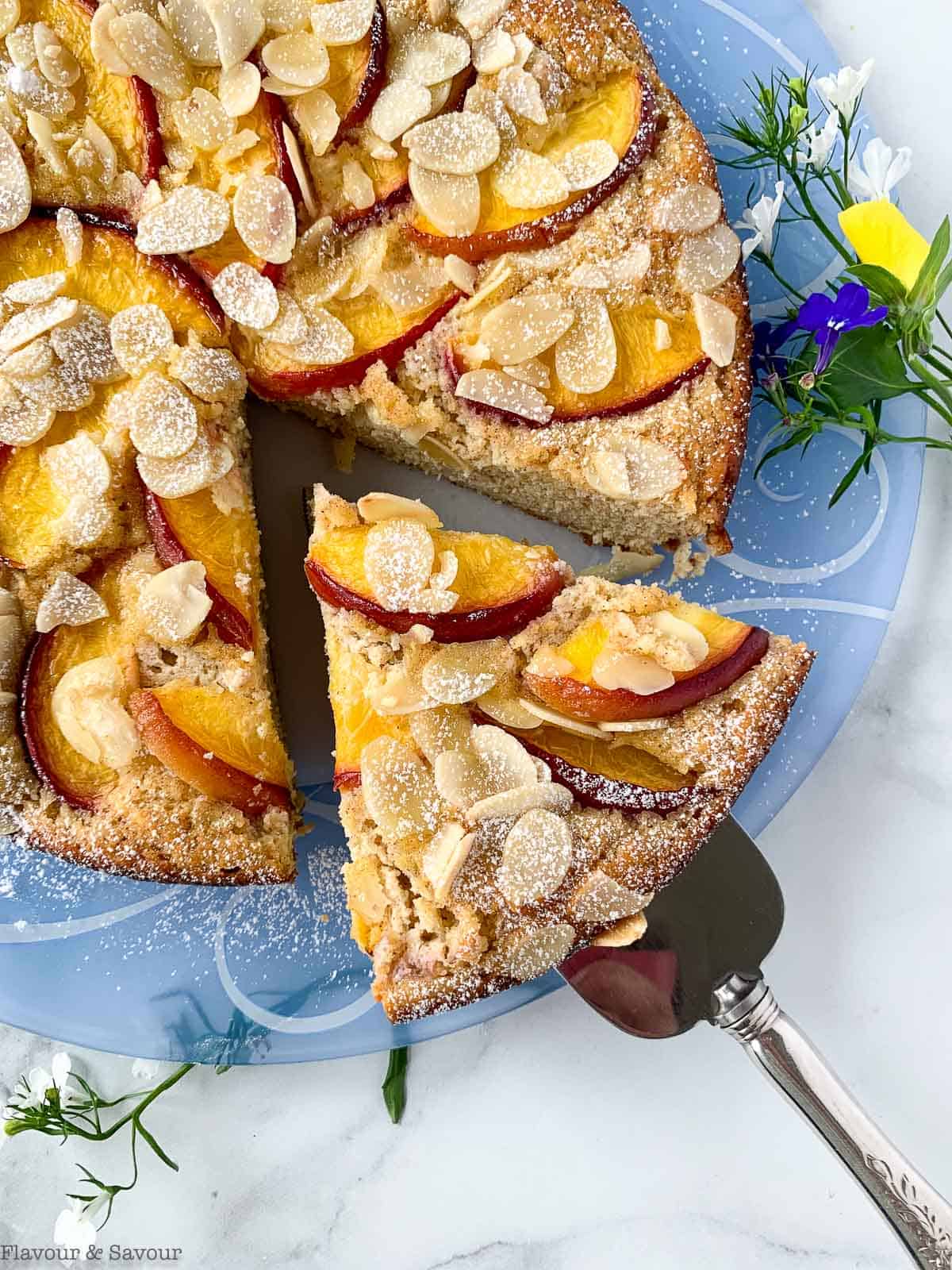 Slicing Flourless Nectarine Ricotta Cake