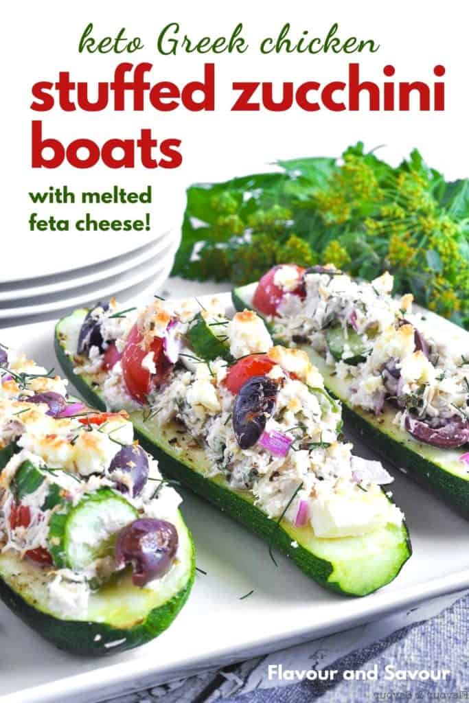 Pinterest image for Greek Chicken Stuffed Zucchini Boats with melted feta cheese
