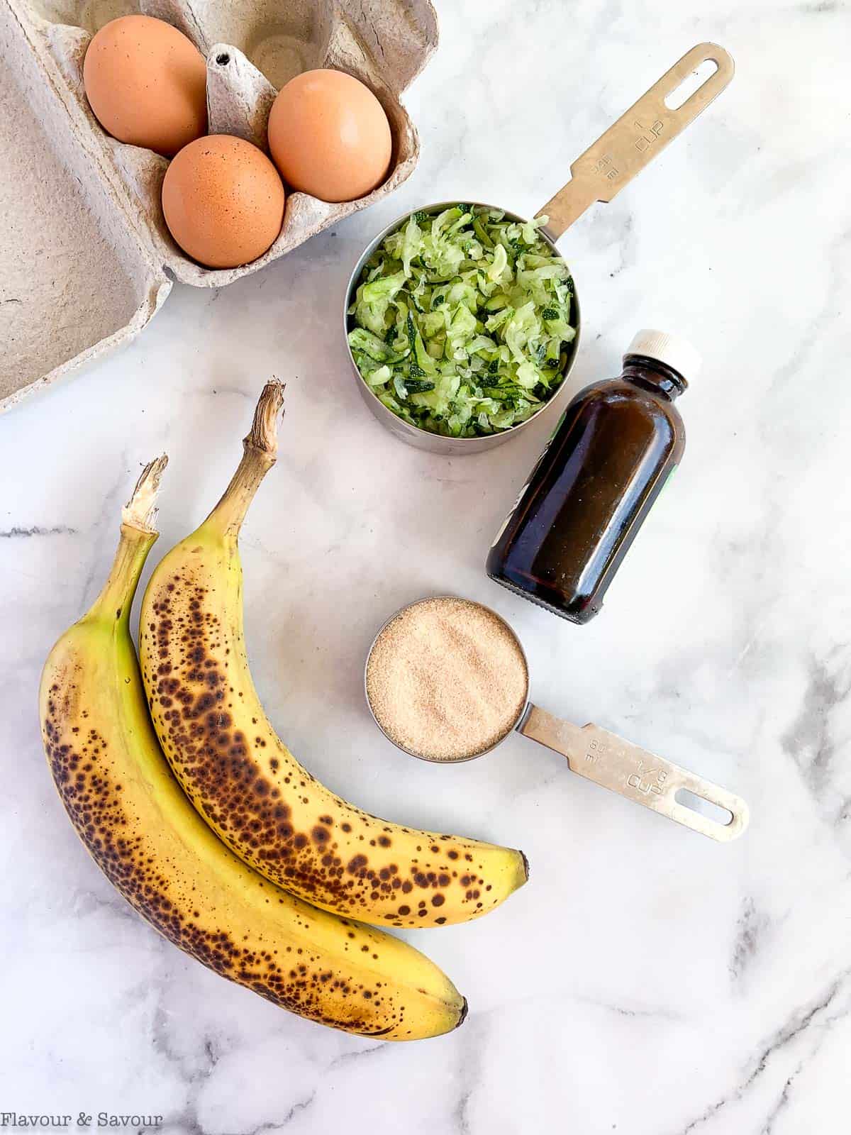 Wet ingredients for Zucchini Banana Muffins.