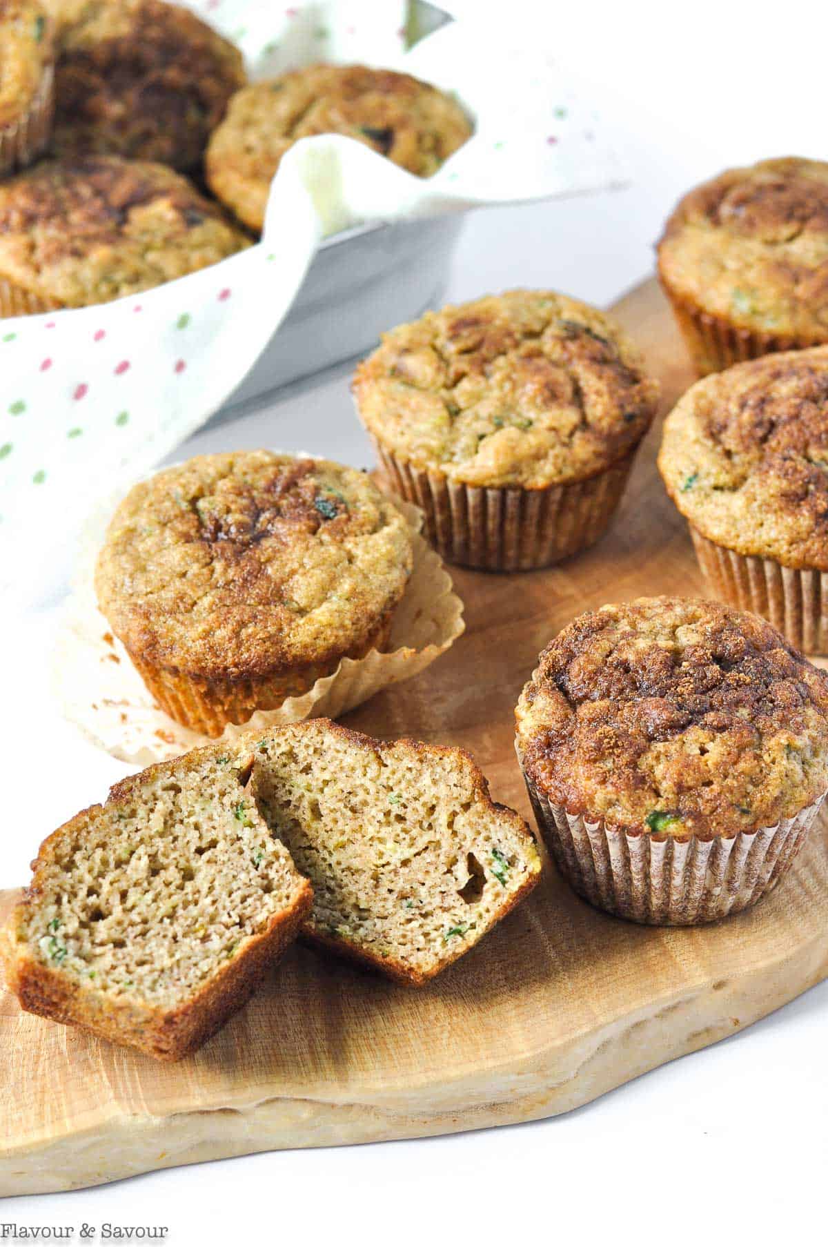 Gluten-free Zucchini Banana Muffins on a wooden board.