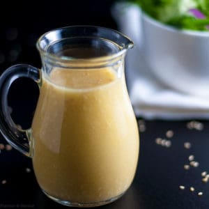 Sesame Miso Dressing in a small glass pitcher