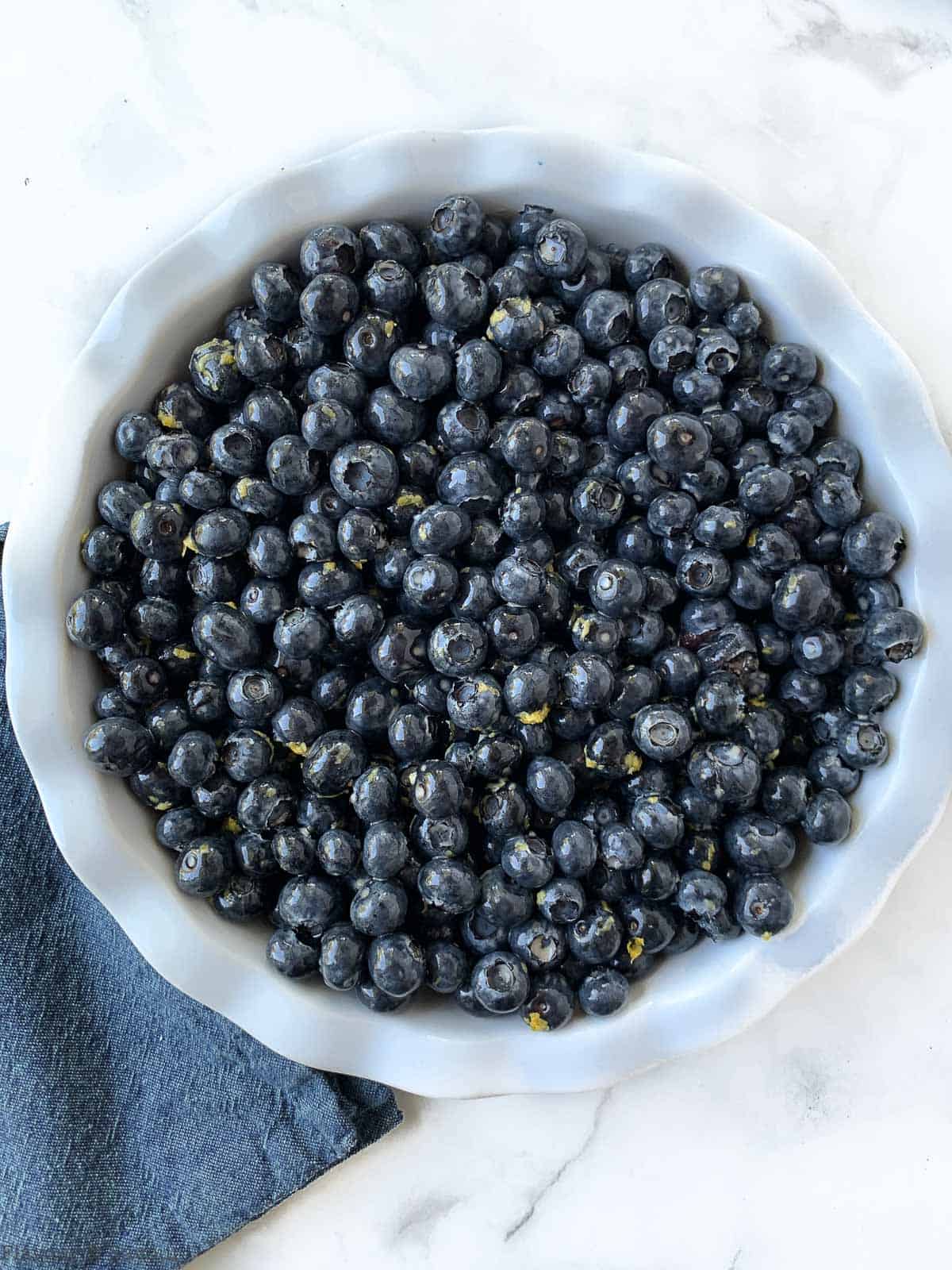 Blueberries in a baking dish.