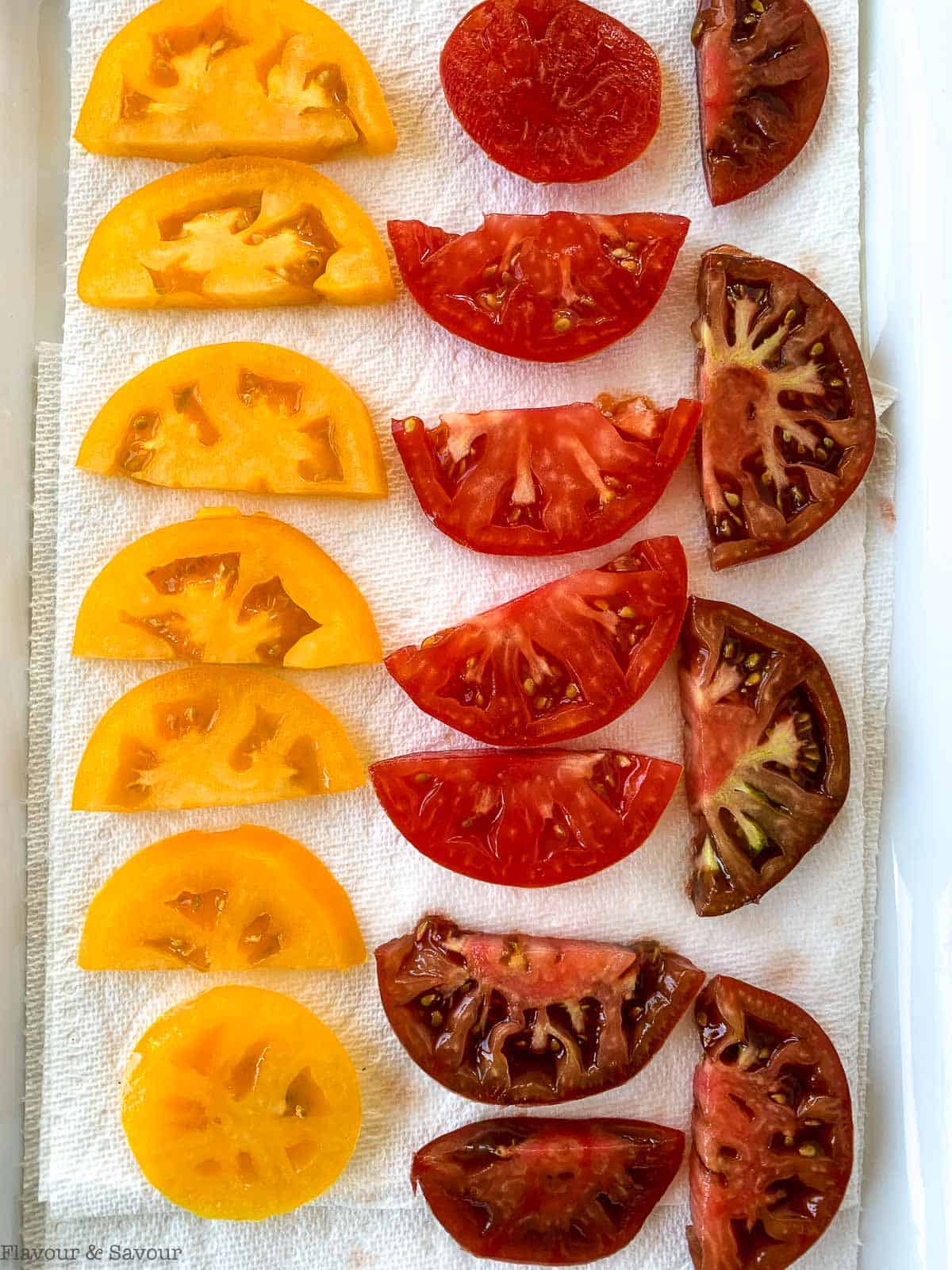 Draining tomatoes on paper towel.