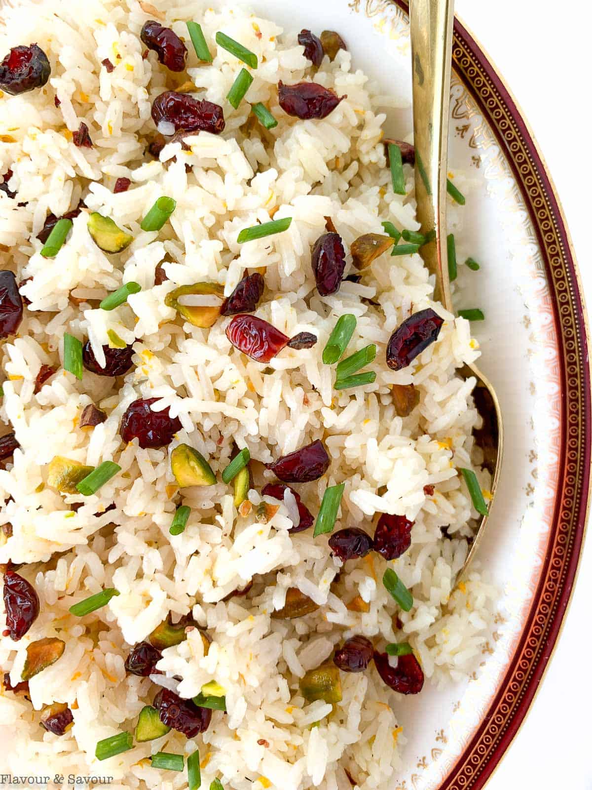 cooked jasmine rice with cranberries and pistachios.