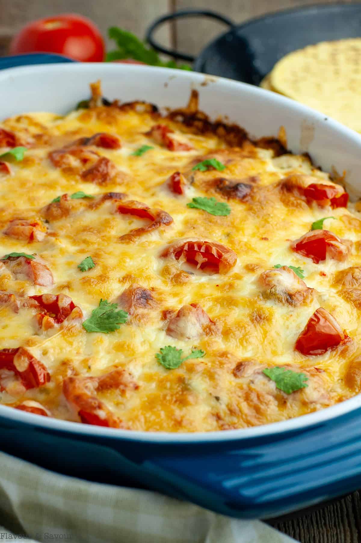 Close up view of Salsa Verde Chicken Tortilla Bake.