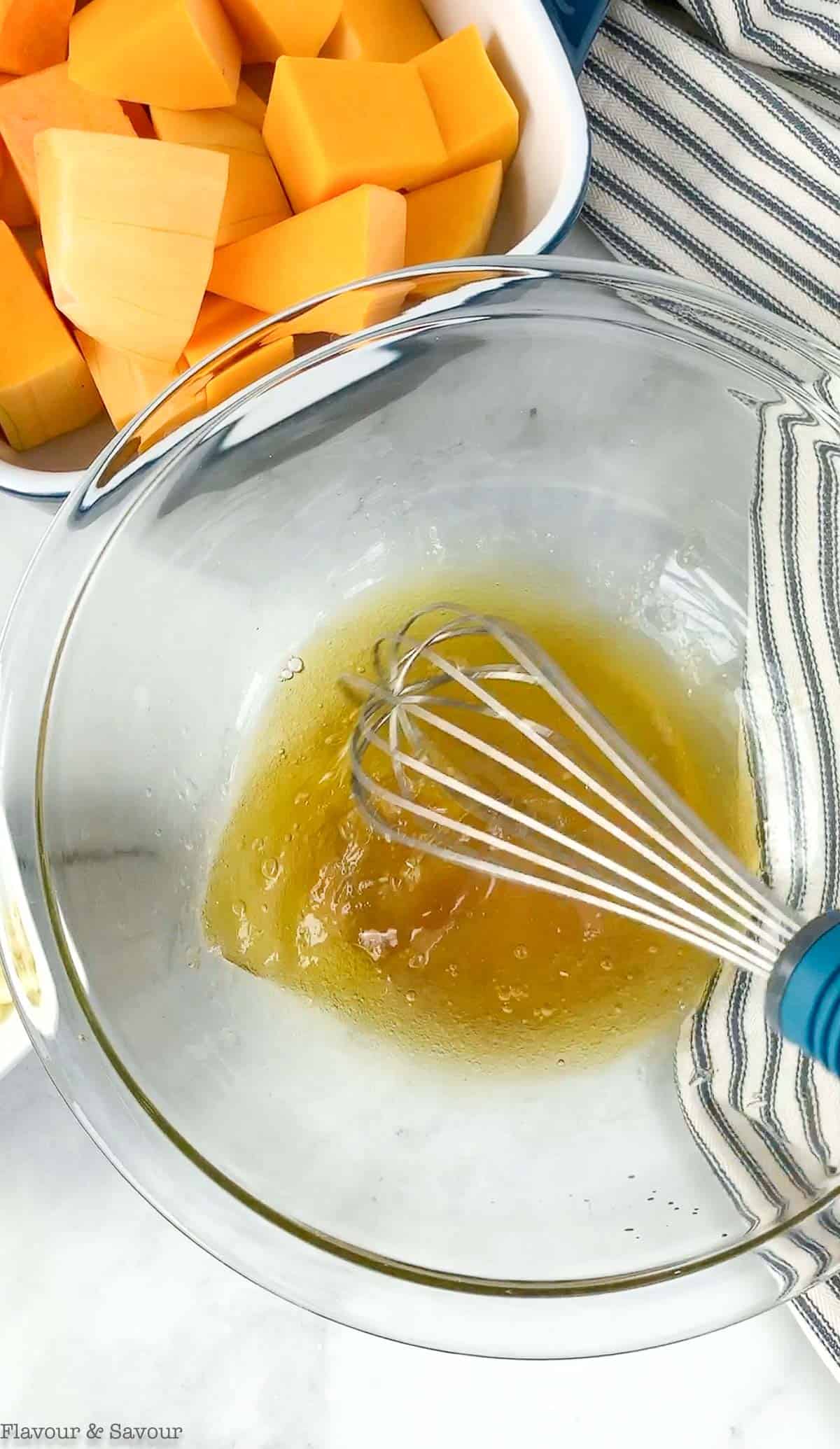 Peel and cube the squash, then whisk the marinade ingredients.