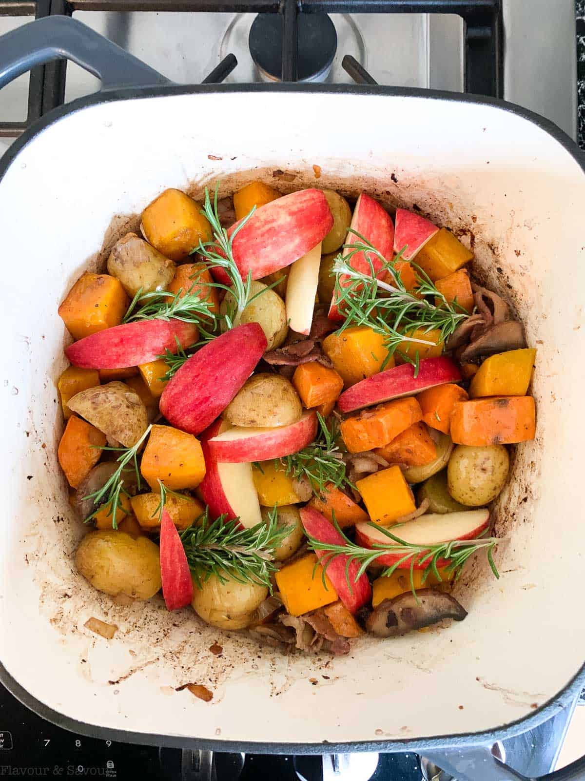 adding vegetables to the pot