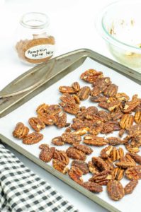 Pumpkin Spice Pecans on a baking sheet