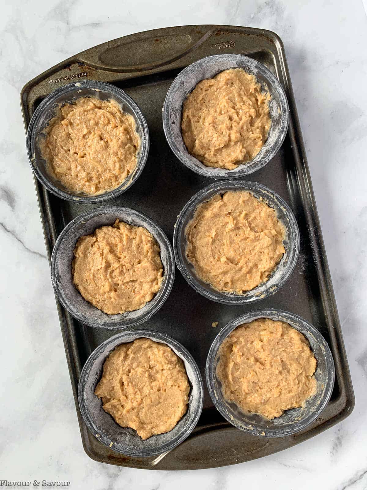 Mini Bundt pans filled with batter