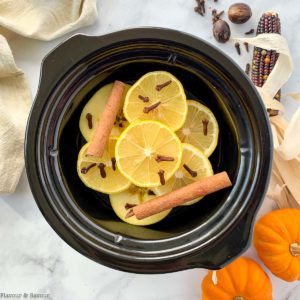 Fall Potpourri Mix apples, lemons and spices in a mini slow cooker