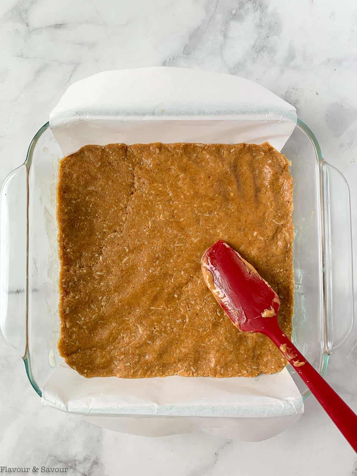 Spread peanut butter batter in square pan