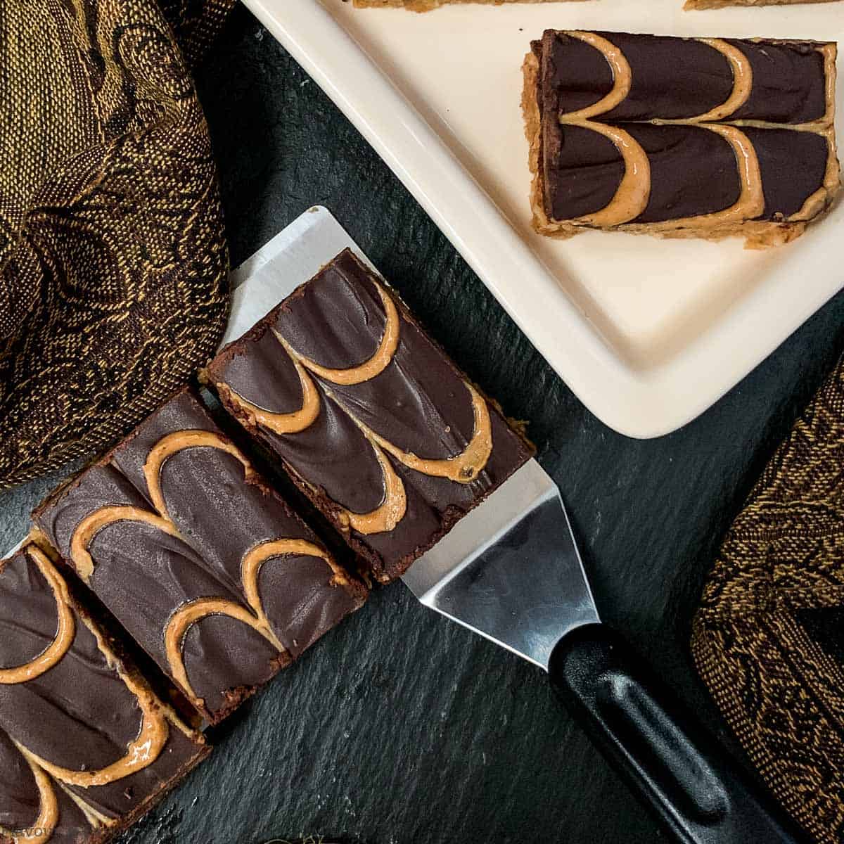 Overhead view of Peanut Butter Chocolate Bars with a small serving lifter