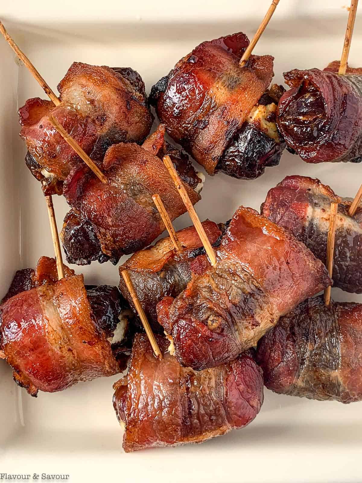 Air Fryer Bacon-Wrapped Dates on toothpicks