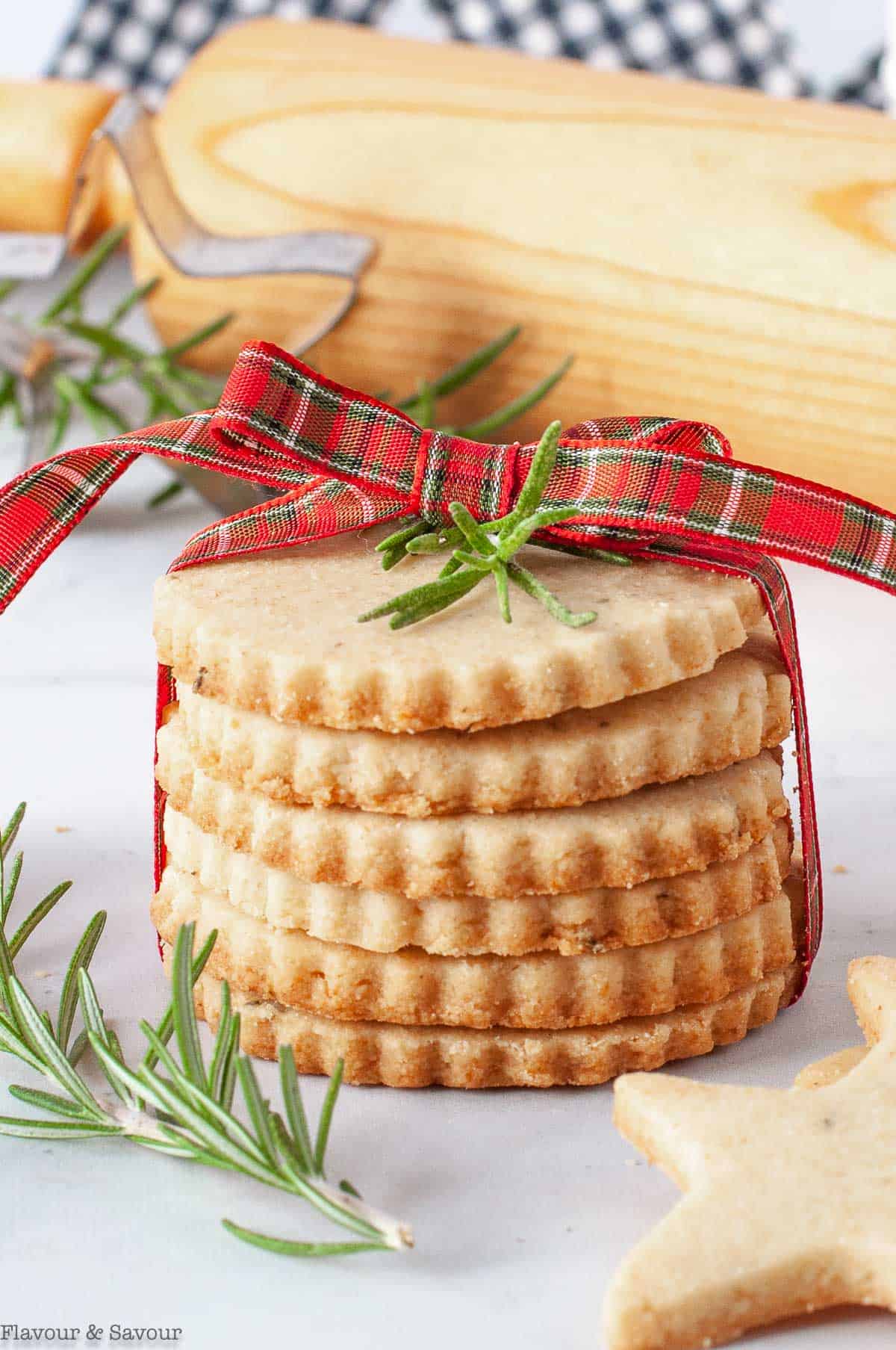 A stack of cookies tied with a plaid ribbon