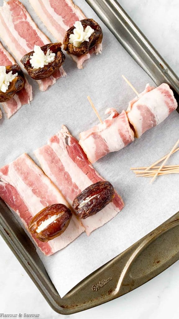 wrapping stuffed dates with bacon