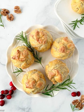 Overhead view of a plate of 5 Cranberry Walnut Beggars' Purses Appetizers