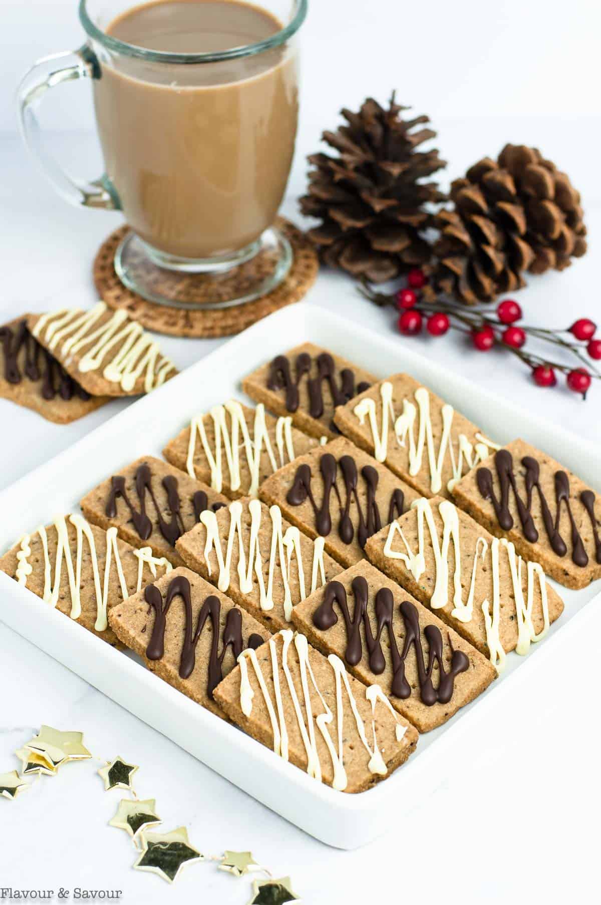 Espresso Almond Flour Shortbread Cookies on a plate with a cup of coffee.