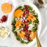 Winter Persimmon Kale Salad with Pomegranate overhead view