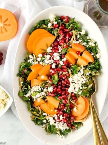 Winter Persimmon Kale Salad with Pomegranate overhead view