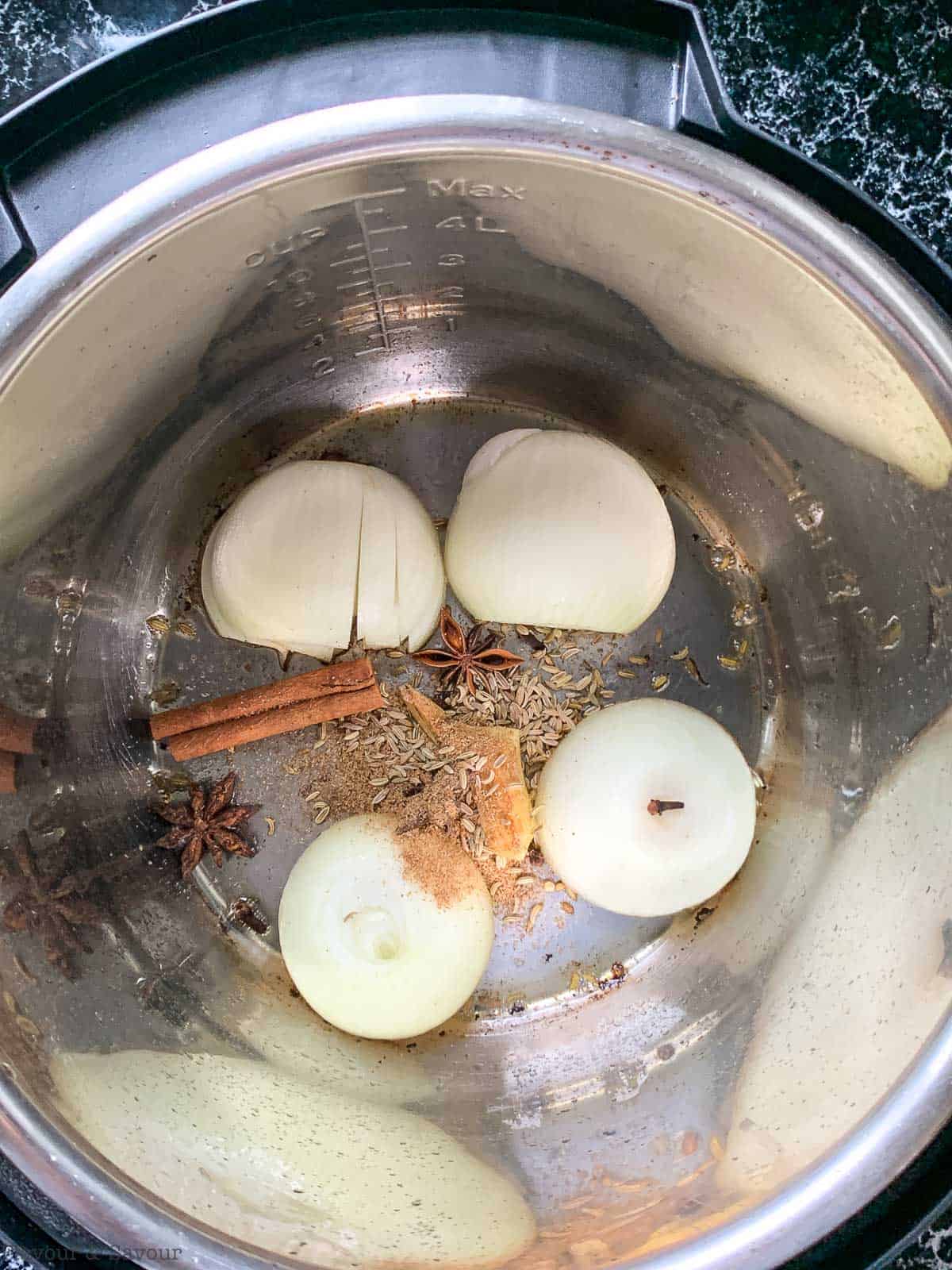 Charring whole spices, cinnamon, star anise, coriander, fennel and cloves in an Instant Pot.