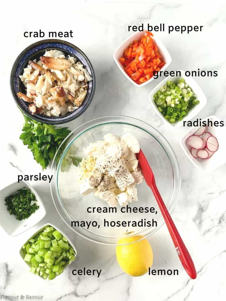 Overhead view of ingredients with labels for cold crab meat dip