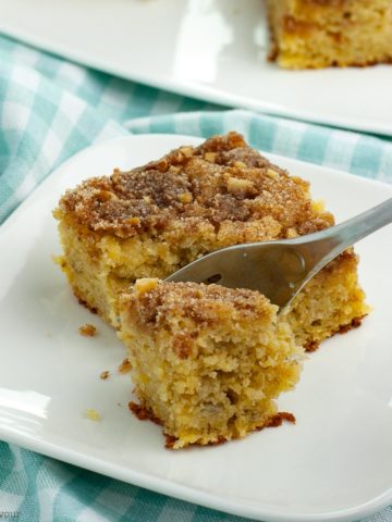 a forkful of Grain Free Banana Coffee Cake on a turquoise cloth