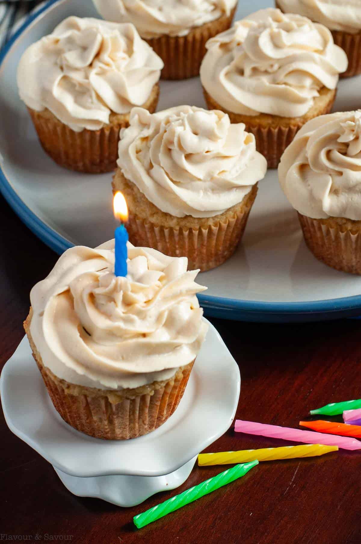 Grain-free Banana Cupcake with cream cheese frosting and a candle