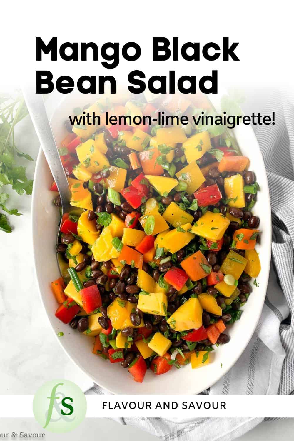 Image with text for mango black bean salad.