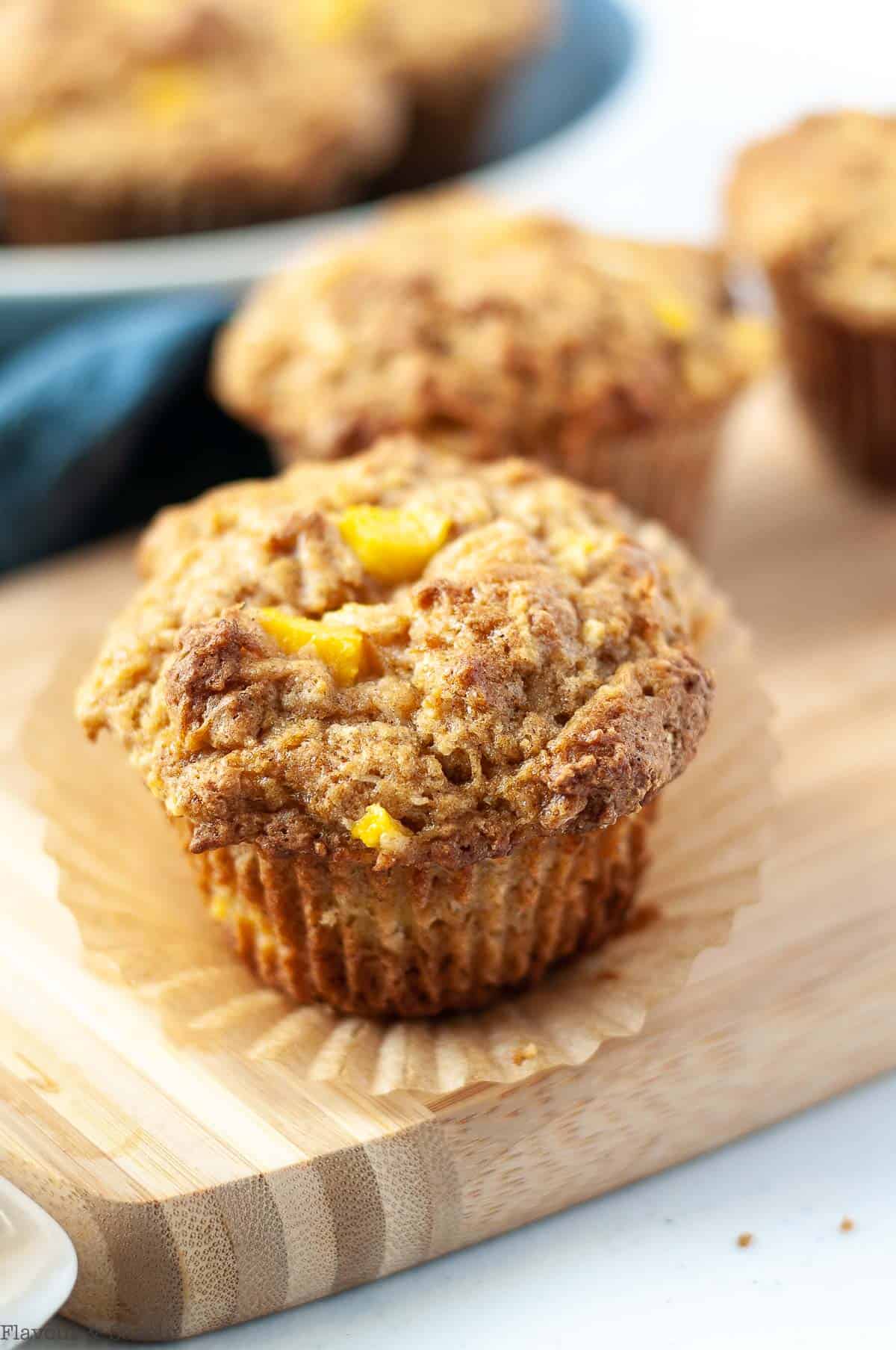 Close up view of a gluten-free Mango Coconut Muffin