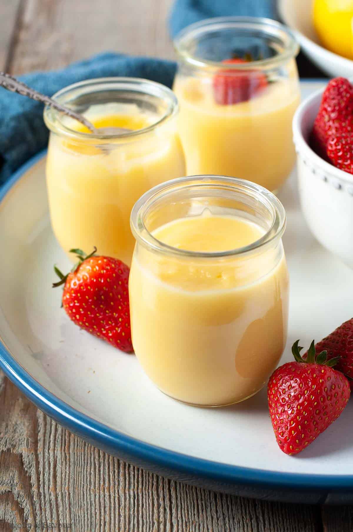 3 jars of Microwave Lemon Curd with fresh strawberries, a gluten-free dessert for Easter and Spring
