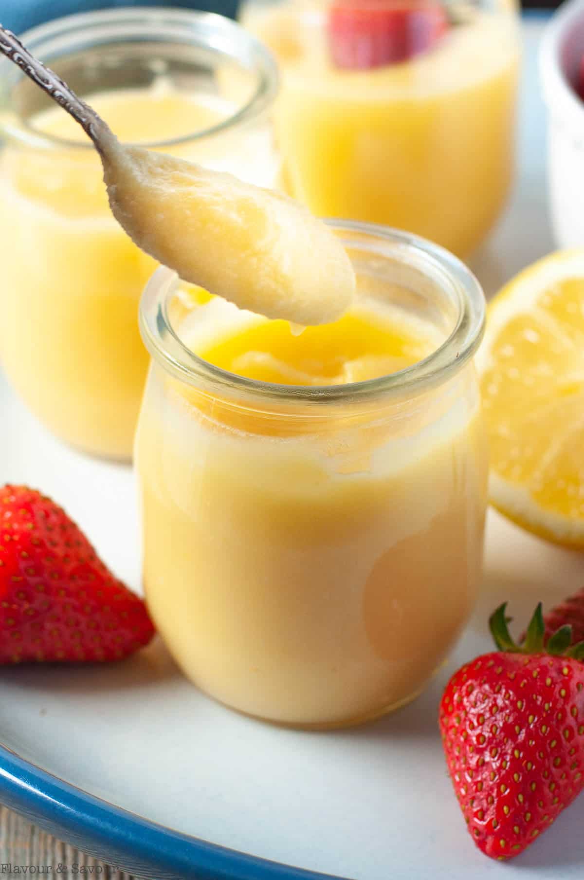 A spoonful of microwave lemon curd from a small jar