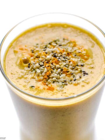 text and close up view of tropical turmeric smoothie with hemp and chia seeds