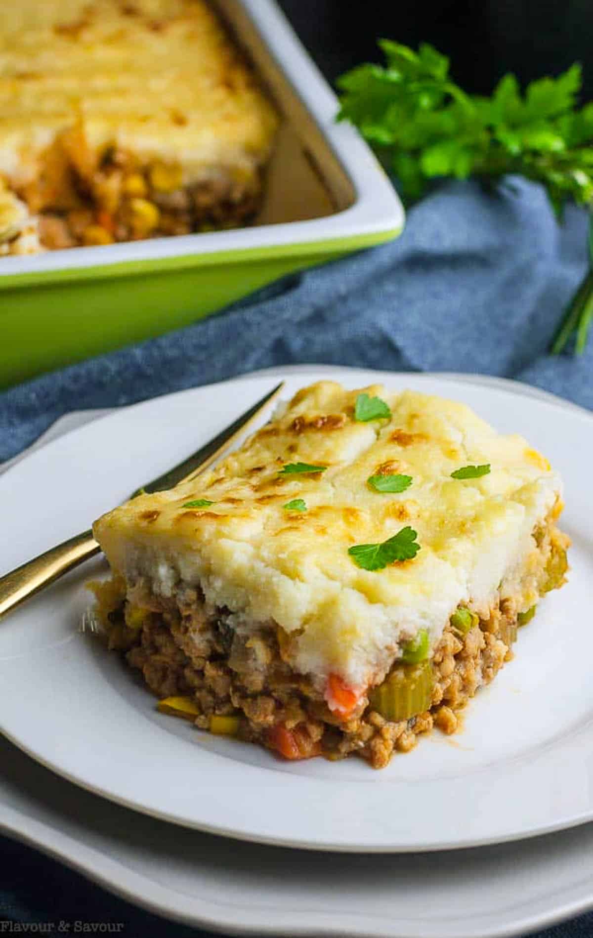 a serving of low-carb shepherd's pie with mashed cauliflower crust