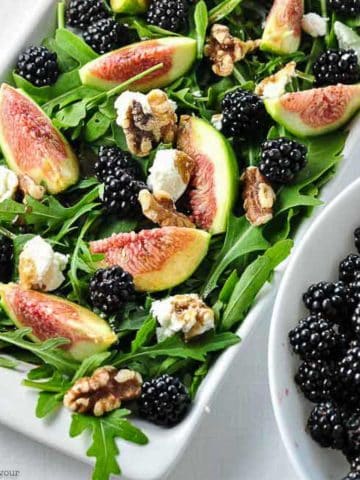 Fresh fig salad with blackberries, goat cheese and walnuts